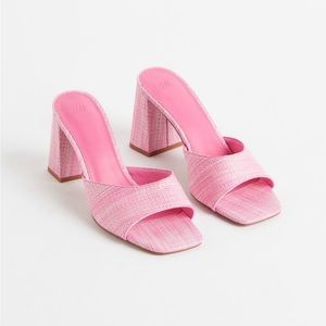 Pink straw like mules